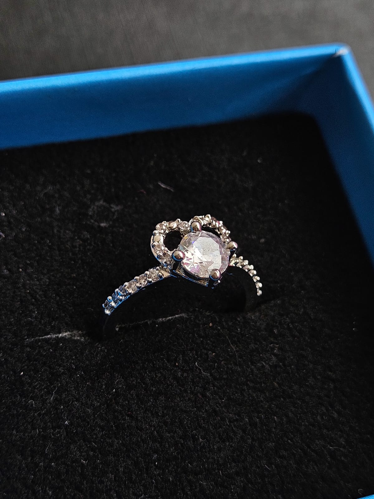 "Elegant Solitaire Halo Twist Ring"