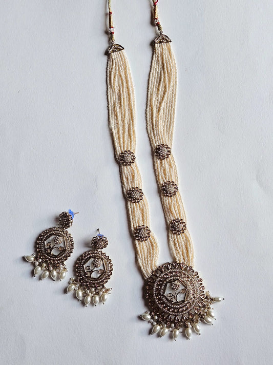Elegant Kundan Pearl Multi-Strand Necklace Set with Matching Earrings